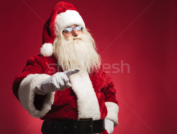 Kerstman wijzend vinger trekken aandacht hand Stockfoto © feedough