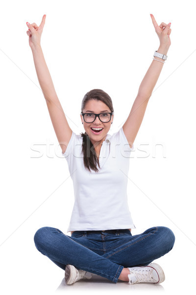 casual woman sits & cheers up Stock photo © feedough