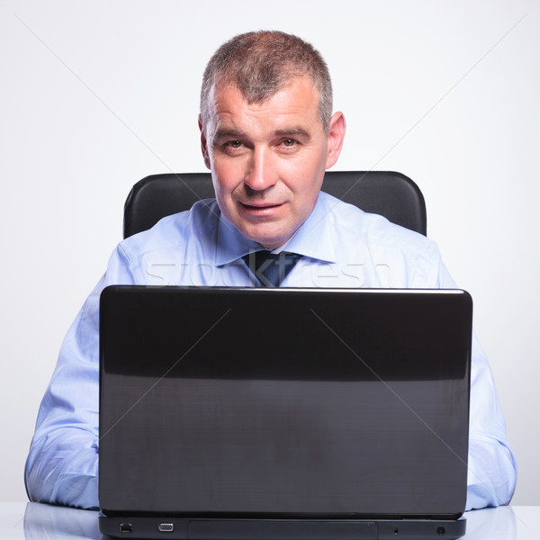 Stock photo: old business man working at laptop