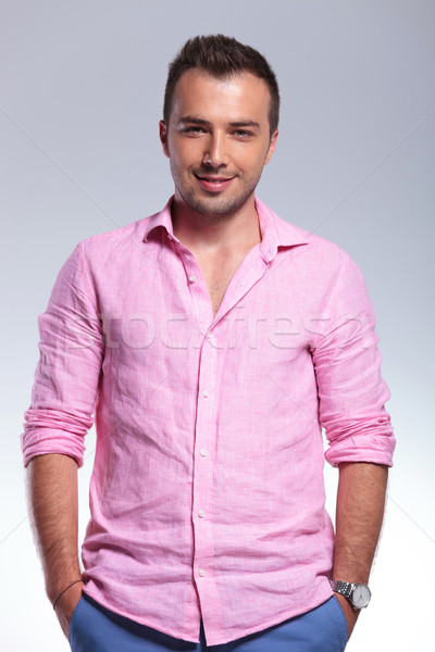 smiling casual man with both hands in pockets Stock photo © feedough