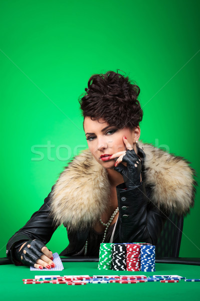 pensive lady plays poker Stock photo © feedough