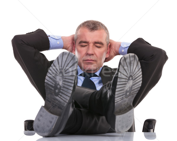 business man sleeps with feet on desk Stock photo © feedough