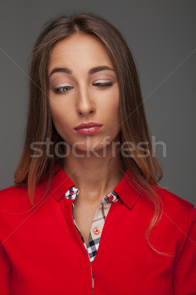 Jóvenes mujer estúpido cara gris Foto stock © feedough