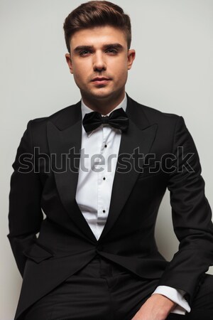 Stock photo: handsome elegant man in tuxedo and bowtie 