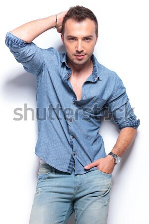casual man adjusting his hair Stock photo © feedough