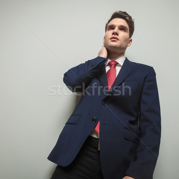 Concerned business man looking away  Stock photo © feedough