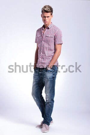 casual man with raised eyebrow Stock photo © feedough