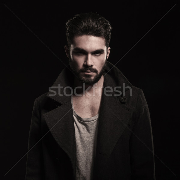 cool unshaved fashion model smiling at the camera Stock photo © feedough