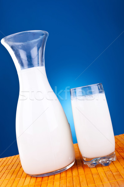 glass and jar of fresh cow milk  Stock photo © feedough