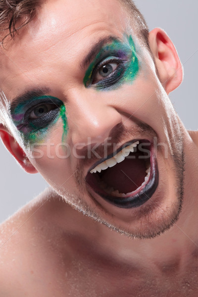 casual man with makeup laughs out loud Stock photo © feedough