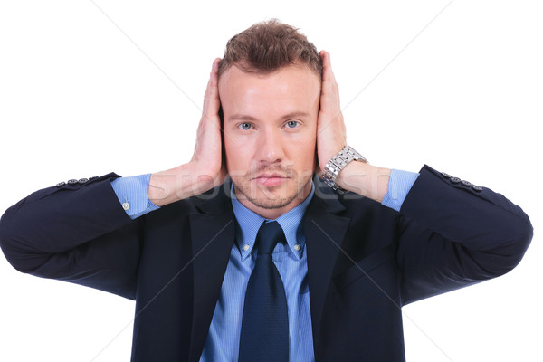 Om de afaceri nu rău tineri urechile mâini Imagine de stoc © feedough