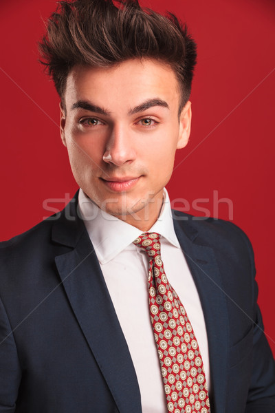 closeup young businessman in black suit with red tie Stock photo © feedough