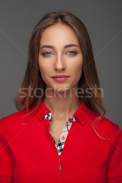 portrait of an attractive woman in red polo shirt  Stock photo © feedough