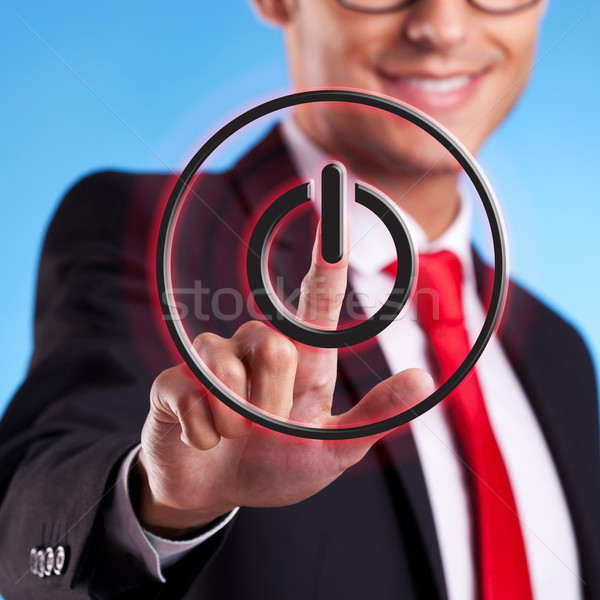 business man pressing ON OFF button  Stock photo © feedough