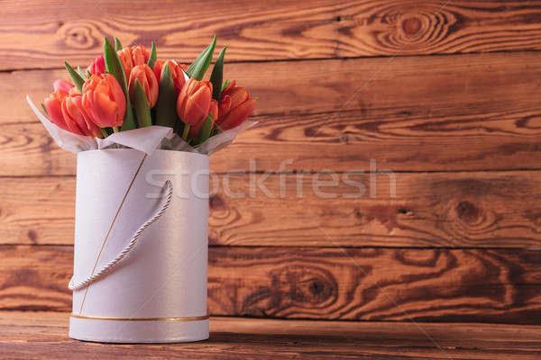 colorfull bunch of tulips in a round box Stock photo © feedough