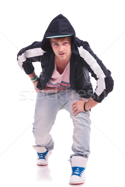 man leaning forward on his knee Stock photo © feedough