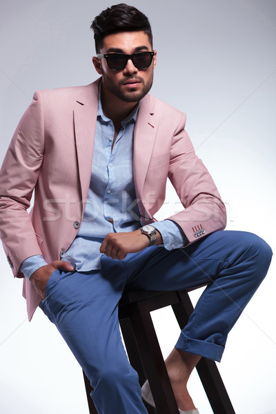 seated casual man looking into the camera Stock photo © feedough