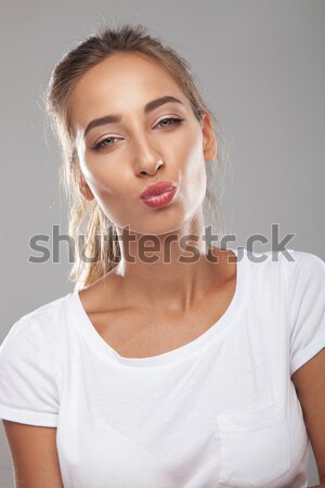 closeup picture of a  woman with shirt down her shoulders Stock photo © feedough