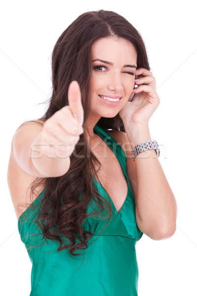 Stock photo: woman talking by cell phone