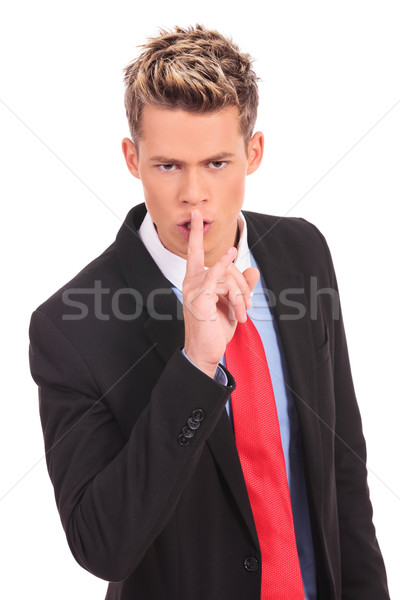 business man showing silence gesture  Stock photo © feedough