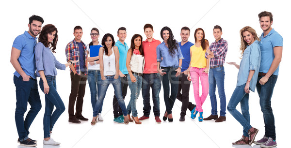 young casual people inviting you to join their team Stock photo © feedough