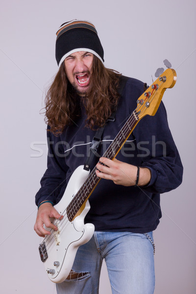 Musiker spielen Bass Gitarre jungen Stock foto © feelphotoart