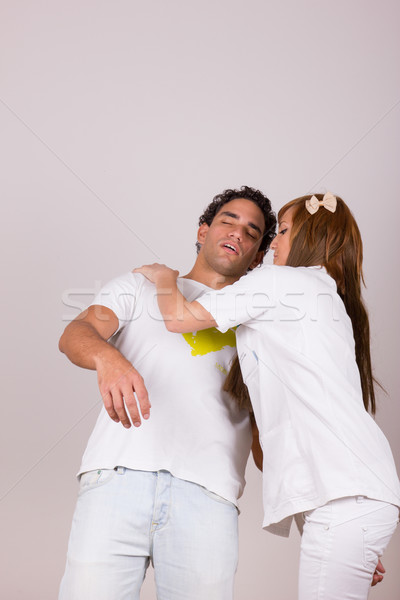 professional nurse holding sick fainting man Stock photo © feelphotoart