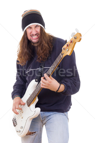 Agresywny mężczyzna muzyk gry bas gitara Zdjęcia stock © feelphotoart