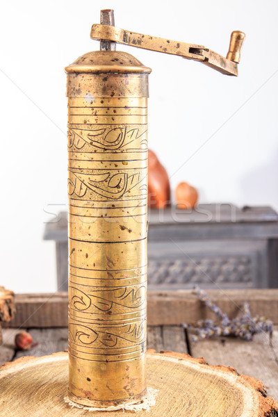 Manuel vintage coffee grinder on wooden table Stock photo © feelphotoart