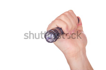 Hand pointed with flashlight Stock photo © feelphotoart
