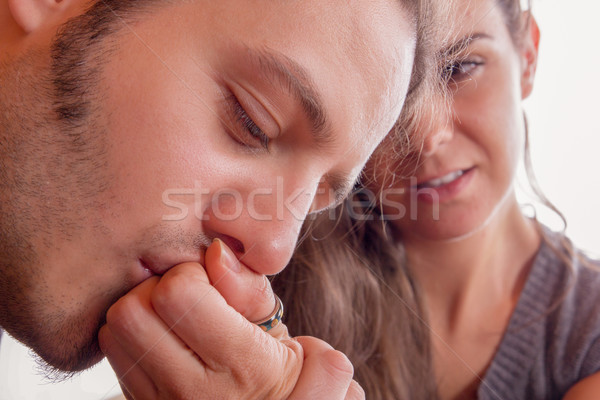 man gently kisses hand of his girlfriend Stock photo © feelphotoart