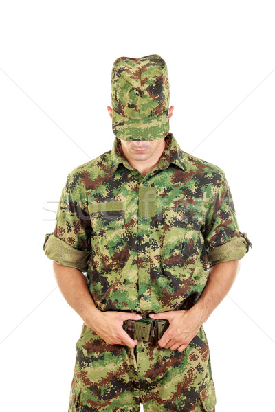 Military soldier in camouflage uniform and hat fastened belt Stock photo © feelphotoart