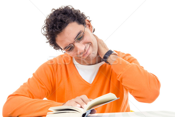 Człowiek ból szyi czytania książki pomarańczowy sweter Zdjęcia stock © feelphotoart