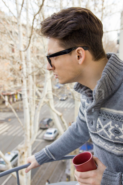 surprised man with glasses and cup of coffee Stock photo © feelphotoart