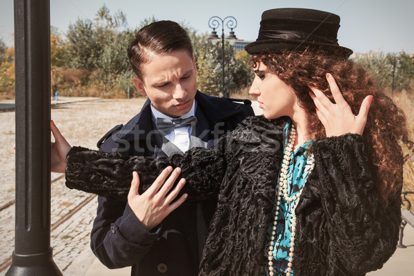 Young fashionable couple alongside a railway line beside street  Stock photo © feelphotoart