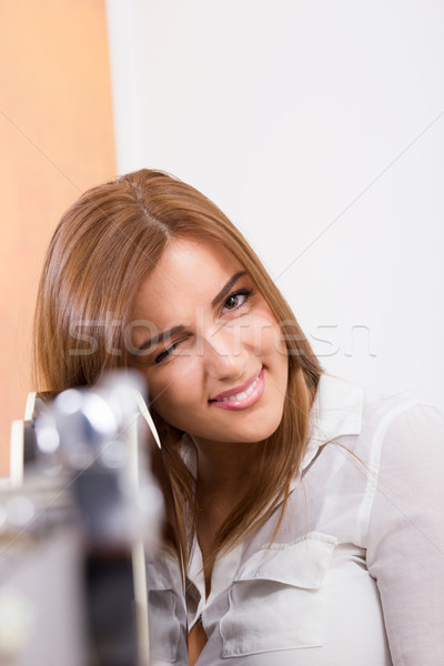 pretty girl pointing guitar at you Stock photo © feelphotoart