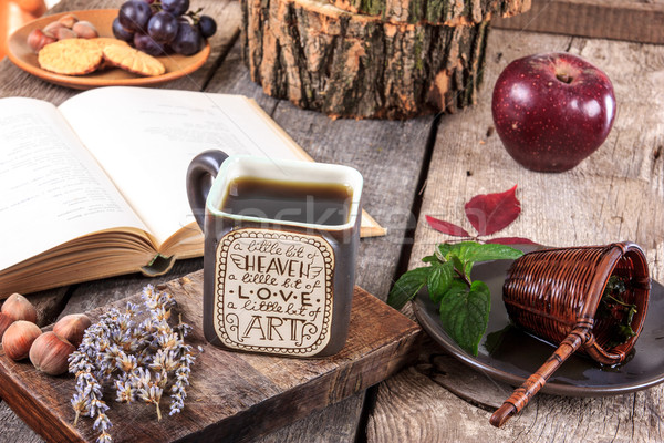 interesting cup of tea with message on a wooden table with a str Stock photo © feelphotoart