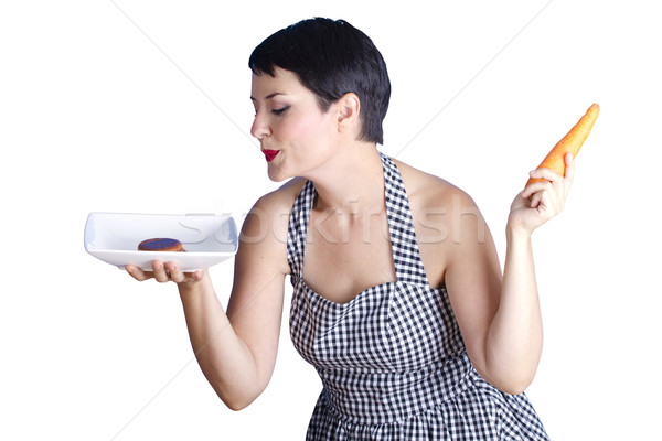 attractive girl with carrot on white background  Stock photo © Fernando_Cortes