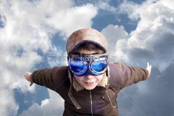 мальчика Flying вверх экспериментального небе Сток-фото © Fernando_Cortes