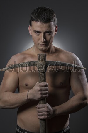 Construction worker with pick axe Stock photo © Fernando_Cortes