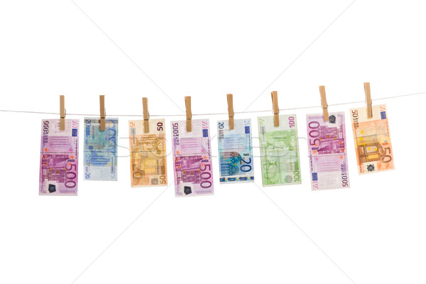 Euro pénz ruhaszárító izolált fehér üzlet Stock fotó © Fesus