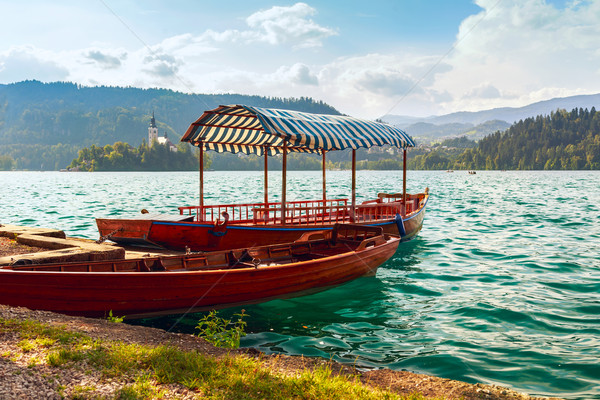 Traditional wooden boats Pletna on lake Bled Stock photo © Fesus