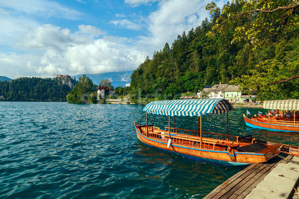 Traditional wooden boats Pletna on lake Bled Stock photo © Fesus