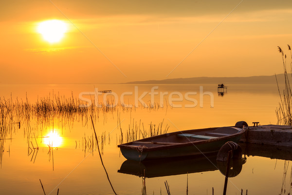 Sunset on the lake Balaton with a boat Stock photo © Fesus