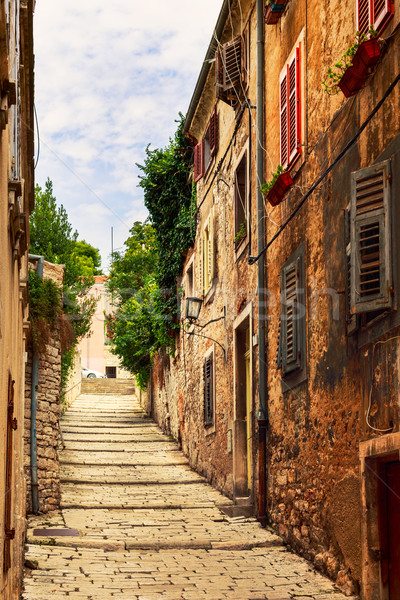 Cozy and narrow streets in Pula's medieval old town Stock photo © Fesus