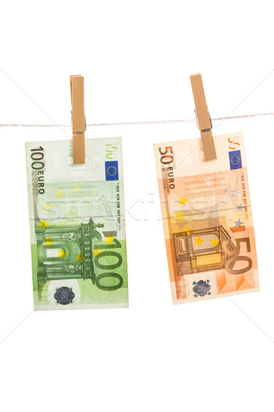Euro pénz ruhaszárító izolált fehér üzlet Stock fotó © Fesus
