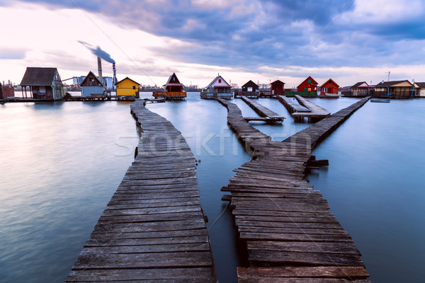 Pôr do sol lago pier pescaria Foto stock © Fesus