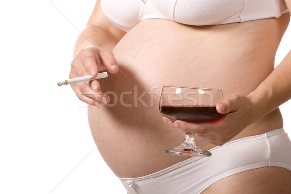 беременная женщина вино сигарету рук женщины пить Сток-фото © Fesus