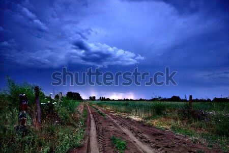 Rural route sombre nuages ​​d'orage herbe nature [[stock_photo]] © Fesus