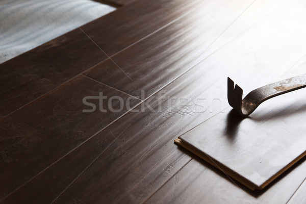 Pry Bar Tool with New Laminate Flooring Stock photo © feverpitch